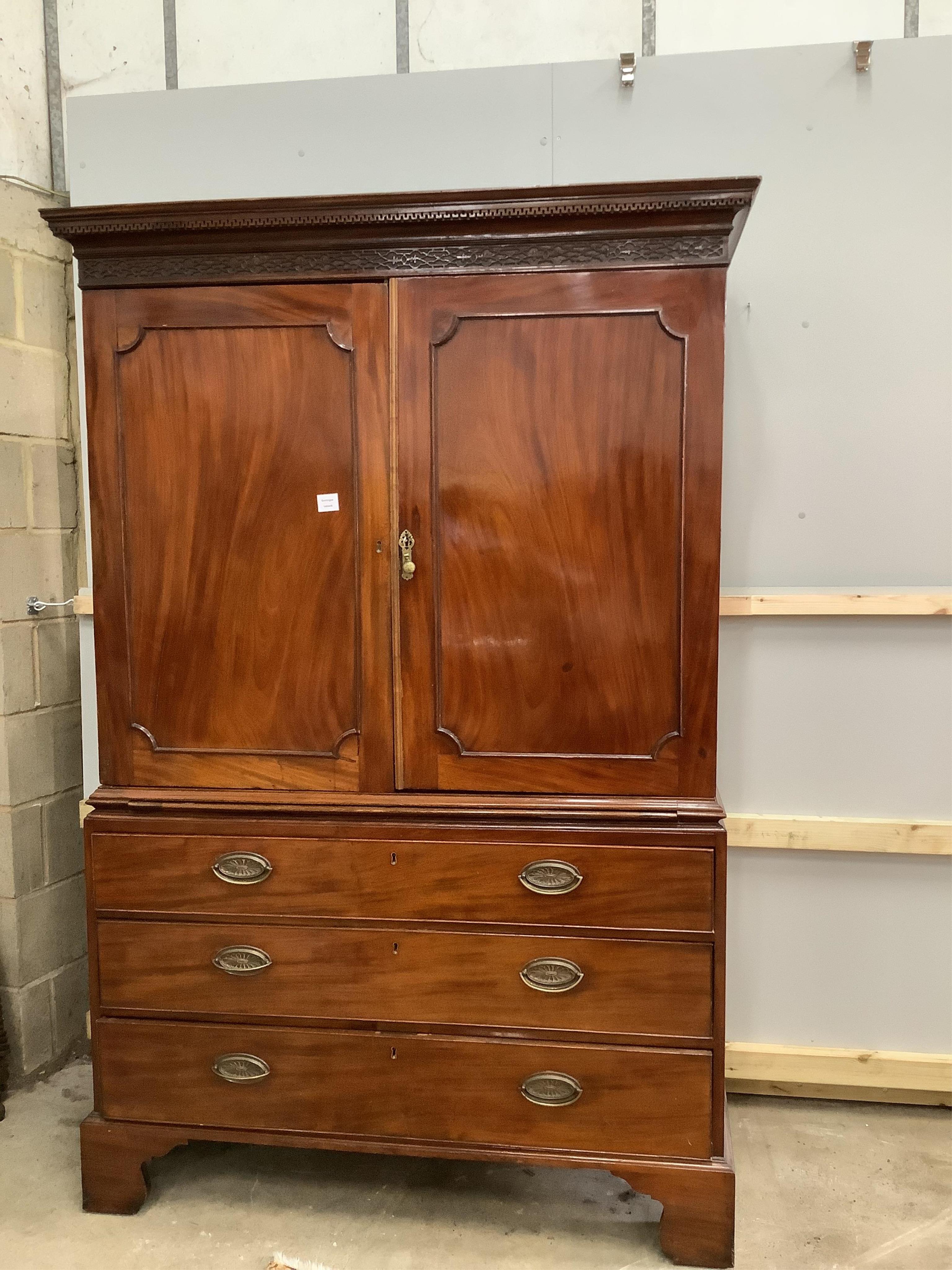 A George III and later mahogany linen press, width 132cm, depth 58cm, height 199cm. Condition - fair